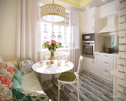 Интерьер кухни с диваном и круглым столом