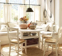 Kitchen interior with sofa and round table