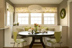 Kitchen interior with sofa and round table