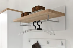 Photo shelf hanger for hallway