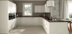 Brown Kitchen With White Countertops In The Interior