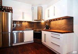Kitchen design with brown countertop