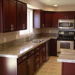 Kitchen design with brown countertop