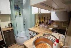 Bathroom and kitchen in one room photo