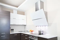 White kitchen and black hood interior