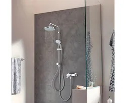 Bath shower with rain shower and faucet photo