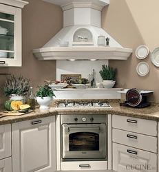 Corner kitchen with stove in the corner photo