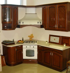 Corner kitchen with stove in the corner photo