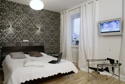 How to highlight a bedroom wall with wallpaper photo