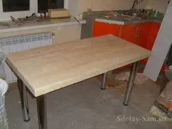 Do-it-yourself table from a countertop for the kitchen photo