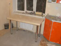 Do-it-yourself table from a countertop for the kitchen photo
