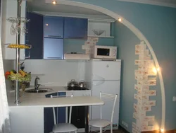 Kitchens with arches and bar counters photo