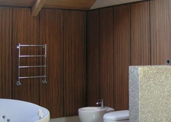 Bathtub with PVC wood panels photo