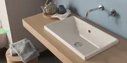 Built-in countertop sinks in the bathroom photo
