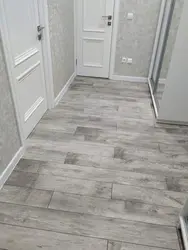 Laminat fotosurati ostida oshxona va koridor uchun zamin plitalari