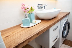 Bath interior with wooden countertop