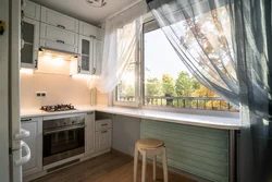 Large window in a small kitchen photo