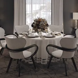 Table and chairs in the living room in a modern style photo