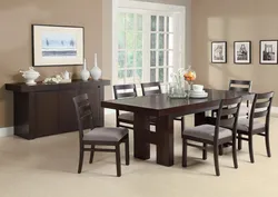 Table and chairs in the living room in a modern style photo