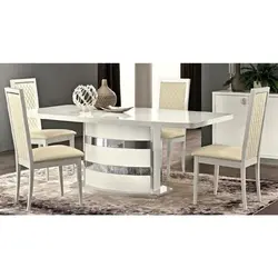 Table and chairs in the living room in a modern style photo