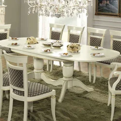 Table and chairs in the living room in a modern style photo