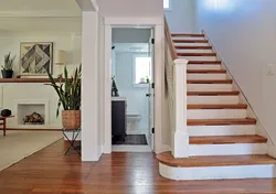 Bathroom design under the stairs in the house