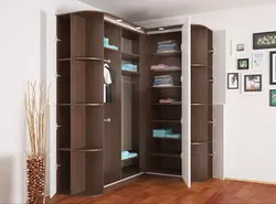Corner wardrobe with drawers in the bedroom photo