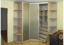 Corner Wardrobe With Drawers In The Bedroom Photo