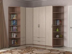 Corner wardrobe with drawers in the bedroom photo