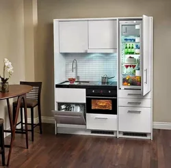 Kitchen with mini refrigerator photo