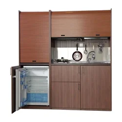 Kitchen with mini refrigerator photo