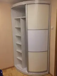 Round wardrobe in the hallway photo