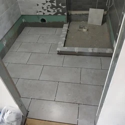 How to tile a bathroom floor photo