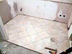 How to tile a bathroom floor photo