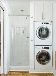 Washing machine drying machine in the bathroom interior