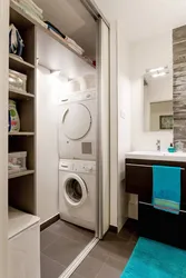 Washing machine drying machine in the bathroom interior