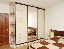 Mirrored wardrobe in the bedroom photo