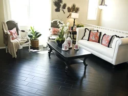 Apartment design with dark floors and light walls