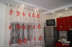 What kind of curtains for a red kitchen photo