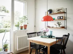 Shelves in the kitchen above the table in the interior