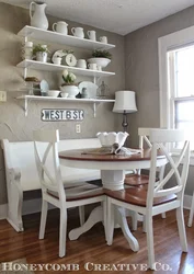 Shelves in the kitchen above the table in the interior