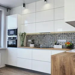 Glossy kitchen with wooden countertops in the interior