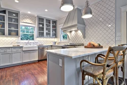 Photo of a kitchen with a gray stove