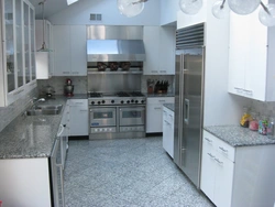 Photo of a kitchen with a gray stove