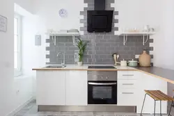 Photo Of A Kitchen With A Gray Stove