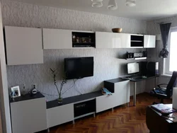 Wall in the living room with a computer desk in a modern style photo