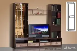 Living room walls show photos