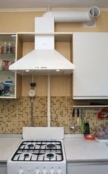 How to attach the hood in the kitchen above the stove to the wall photo