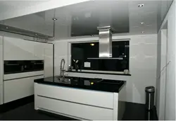 Kitchen interior with suspended black ceiling