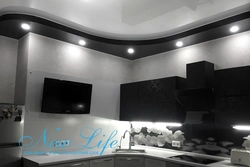Kitchen interior with suspended black ceiling